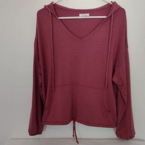 Drop Shoulder Hoodie with kangaroo pockets.